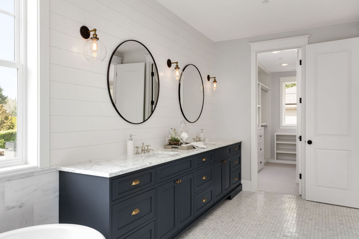 A bathroom with two sinks.