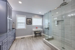 A cohesive home remodel showcasing kitchen and bathroom renovation packages Lancaster PA with matching premium cabinetry and granite countertops.