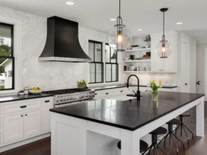 A comparison of different stone surfaces from our how to pick a kitchen countertop guide, featuring quartz, granite, and marble samples for home design
